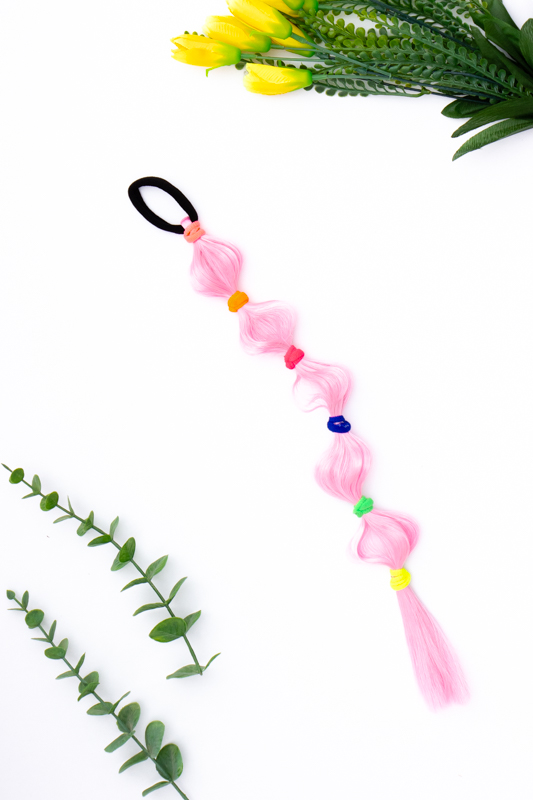 Коси зі штучного волосся на гумках